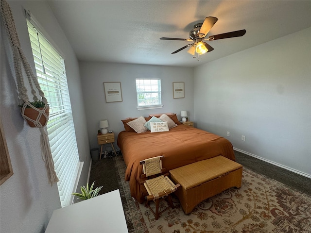 706 Jefferson Ave, Cisco, TX 76437 - bedroom with ceiling fan, carpet, and baseboards