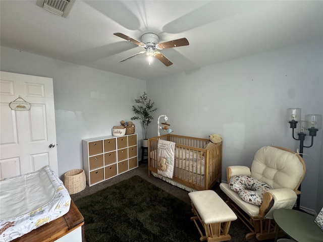 706 Jefferson Ave, Cisco, TX 76437 - bedroom with carpet and a ceiling fan