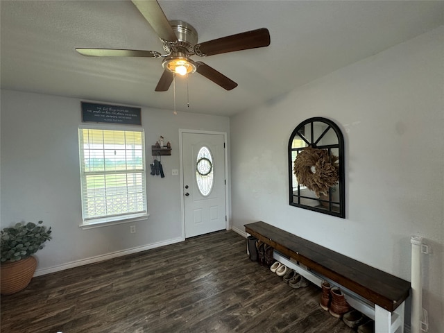 706 Jefferson Ave, Cisco, TX 76437 - foyer with wood finished floors, a ceiling fan, and baseboards