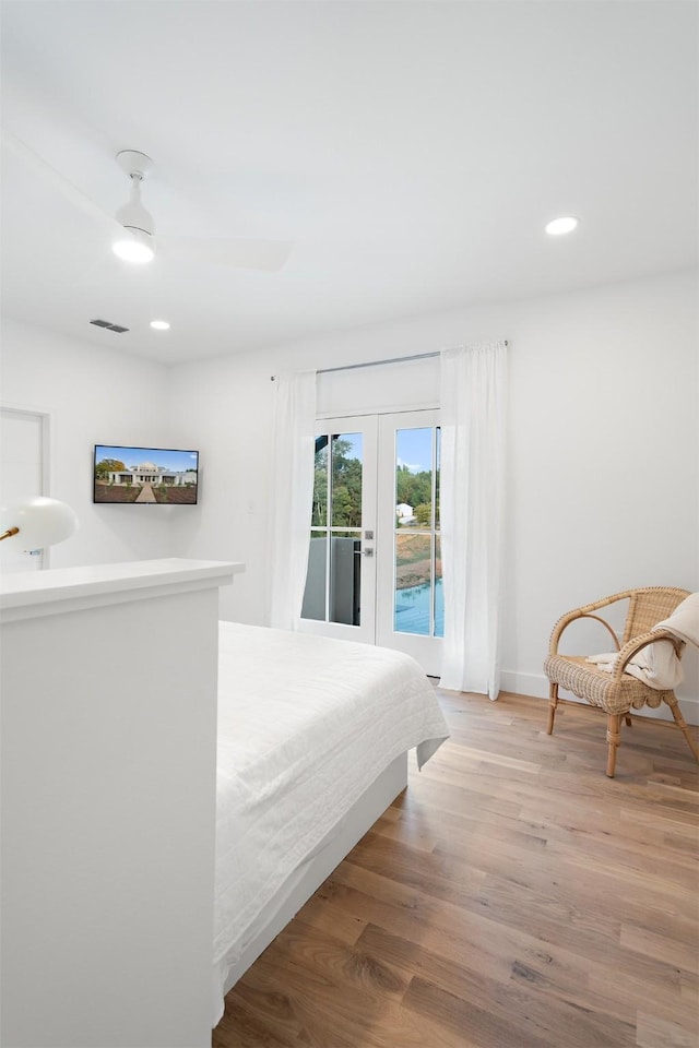 23538 Kate Ln, Arp, TX 75750 - bedroom featuring french doors, access to outside, wood finished floors, recessed lighting, and baseboards