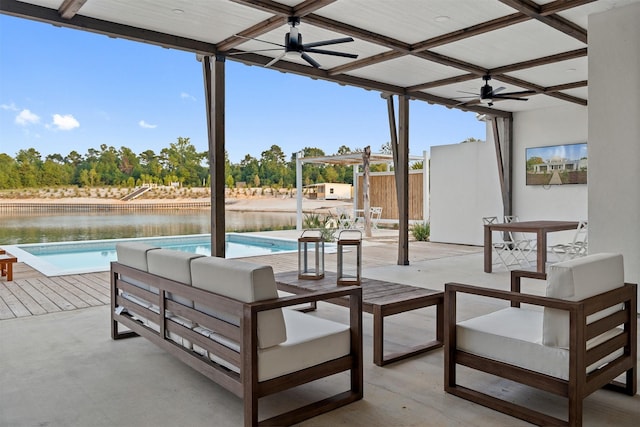 23538 Kate Ln, Arp, TX 75750 - view of patio / terrace with a ceiling fan, an outdoor pool, an outdoor living space, and a water view