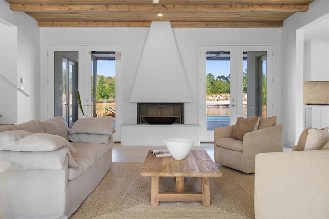 23538 Kate Ln, Arp, TX 75750 - living room featuring french doors, a fireplace, and wood ceiling with exposed beams