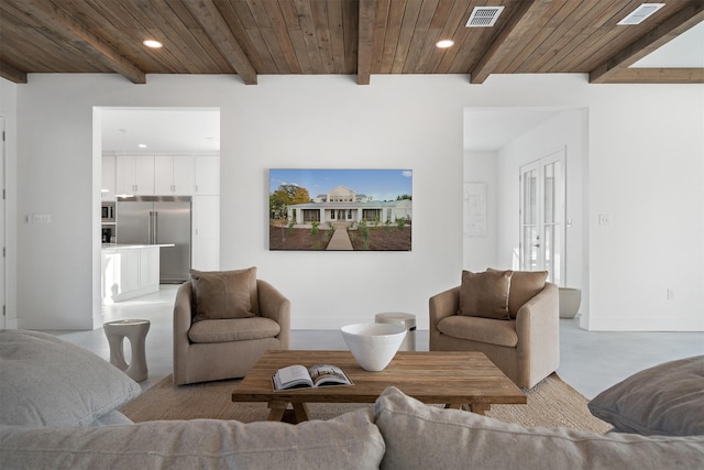 23538 Kate Ln, Arp, TX 75750 - living area featuring wooden ceiling with exposed beams, recessed lighting, concrete floors, and baseboards