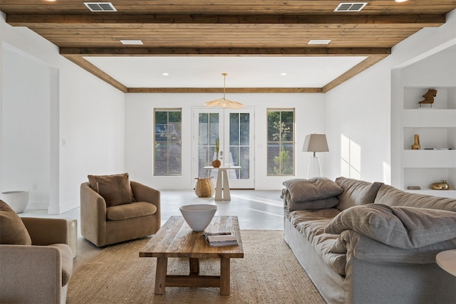 23538 Kate Ln, Arp, TX 75750 - living room with wooden ceiling with exposed beams, french doors, recessed lighting, and built in shelves