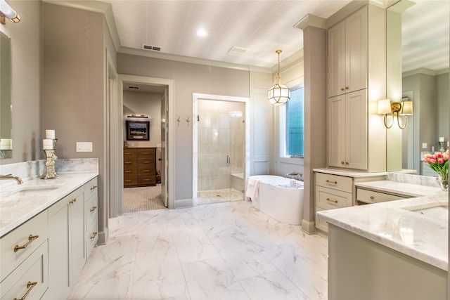5620 Copper Park, Tyler, TX 75703 - full bath featuring two vanities, a shower stall, a freestanding tub, crown molding, and recessed lighting