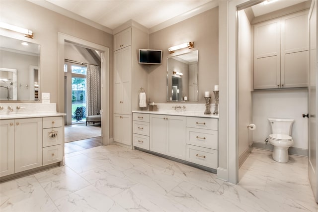 5620 Copper Park, Tyler, TX 75703 - bathroom with marble look tile flooring, two vanities, baseboards, toilet, and ornamental molding