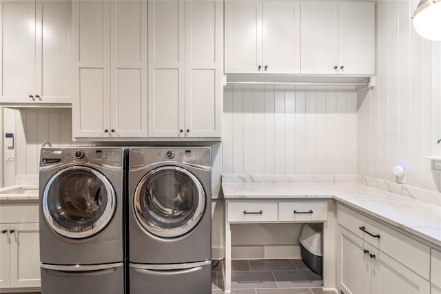 5620 Copper Park, Tyler, TX 75703 - washroom featuring cabinet space, washer and dryer, and tile patterned flooring