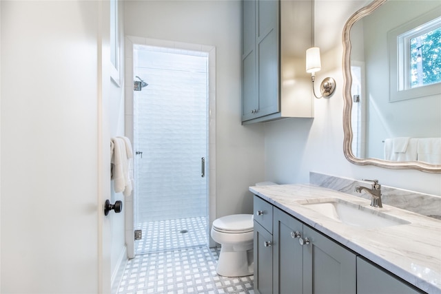 5620 Copper Park, Tyler, TX 75703 - bathroom featuring a shower stall, vanity, toilet, and tile patterned floors