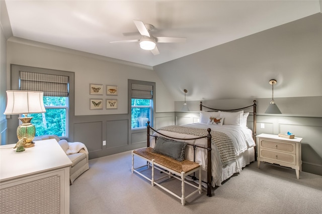 5620 Copper Park, Tyler, TX 75703 - bedroom with carpet flooring, multiple windows, a decorative wall, wainscoting, and a ceiling fan