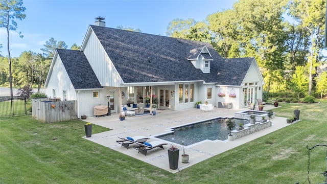 5620 Copper Park, Tyler, TX 75703 - back of property featuring french doors, a patio area, an outdoor living space, a chimney, and a pool with connected hot tub