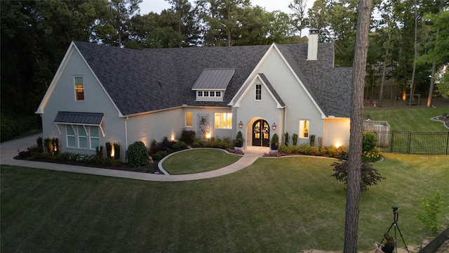 5620 Copper Park, Tyler, TX 75703 - view of front of property featuring a chimney, french doors, and roof with shingles