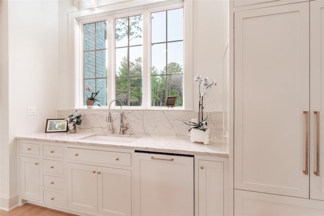 5620 Copper Park, Tyler, TX 75703 - bathroom featuring decorative backsplash and vanity