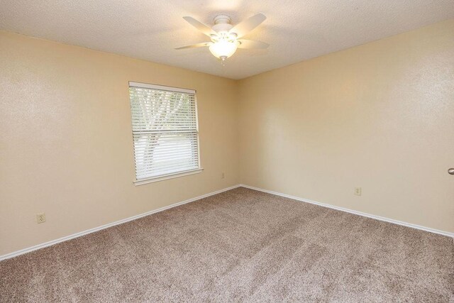 3816 Deep Valley Trl, Plano, TX 75023 - carpeted empty room with a ceiling fan, baseboards, and a textured ceiling