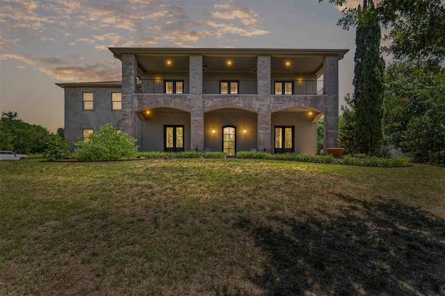 1424 Keeneland Hill Dr, Aledo, TX 76008 - view of front facade featuring french doors, a balcony, and a front yard