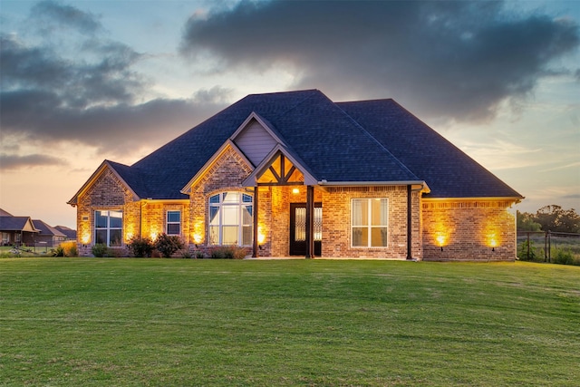 105 Carls Ct, Boyd, TX 76023 - view of front facade featuring a front lawn, brick siding, and roof with shingles