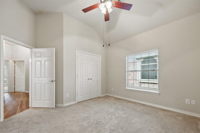 2110 Pecan Ridge Dr, Forney, TX 75126 - unfurnished bedroom featuring carpet floors, high vaulted ceiling, baseboards, a closet, and a ceiling fan