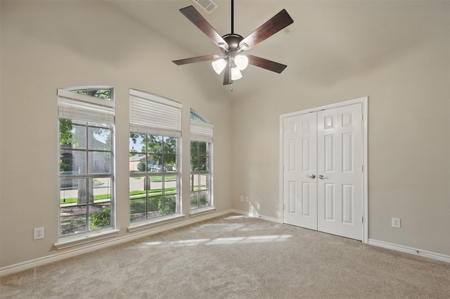 2110 Pecan Ridge Dr, Forney, TX 75126 - unfurnished bedroom featuring multiple windows, carpet flooring, and vaulted ceiling