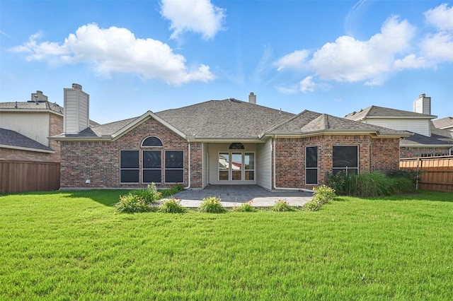 2110 Pecan Ridge Dr, Forney, TX 75126 - rear view of property with brick siding, a patio, and a shingled roof