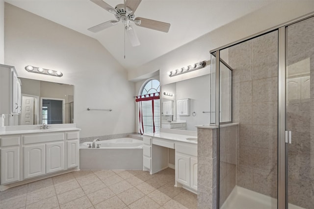 2110 Pecan Ridge Dr, Forney, TX 75126 - bathroom featuring a bath, a stall shower, two vanities, lofted ceiling, and ceiling fan