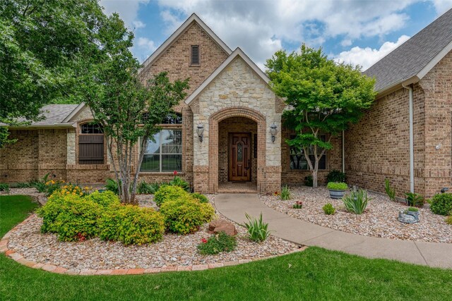 136 Whispering Winds Dr, Gunter, TX 75058 - view of front of home featuring brick siding