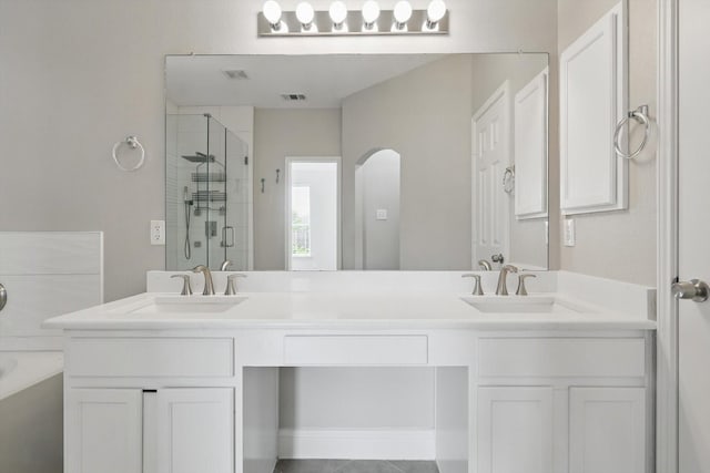 6808 Edgefield Dr, Denton, TX 76210 - full bath featuring a shower stall, double vanity, and a bath