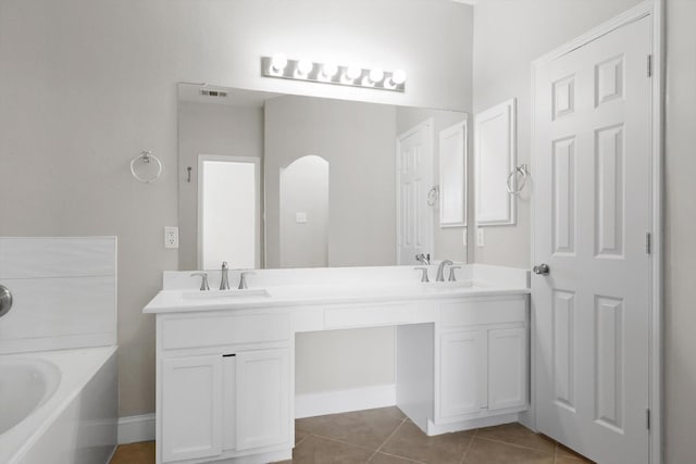 6808 Edgefield Dr, Denton, TX 76210 - full bath featuring double vanity, tile patterned flooring, and a bath