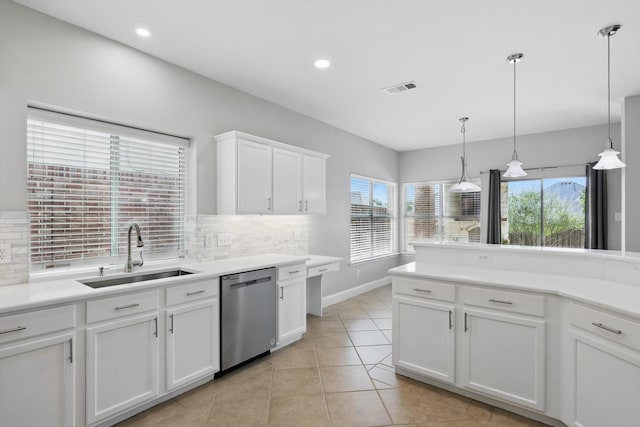 6808 Edgefield Dr, Denton, TX 76210 - kitchen featuring dishwasher, a sink, decorative backsplash, light countertops, and recessed lighting