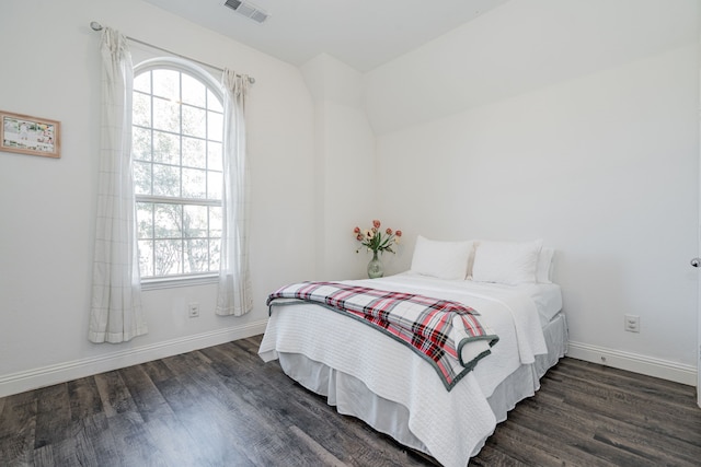 1406 Darlington Ln, Forney, TX 75126 - bedroom featuring multiple windows, dark wood-style flooring, and baseboards