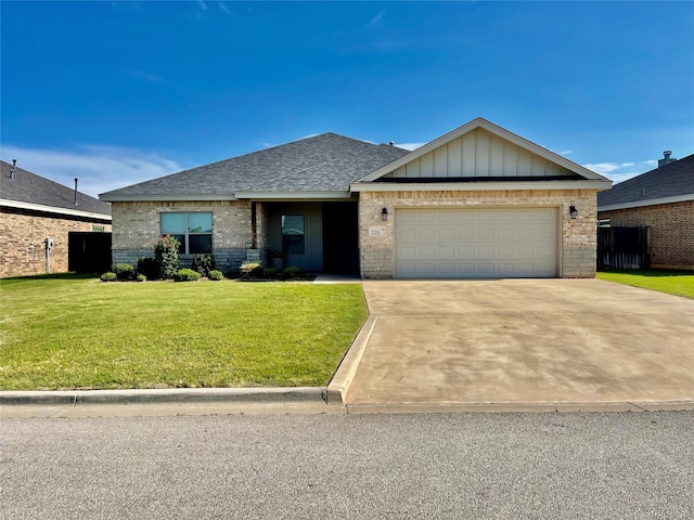 2326 Plymouth Rock Rd, Abilene, TX 79601 - single story home with brick siding, a front yard, roof with shingles, and an attached garage