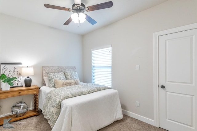 2326 Plymouth Rock Rd, Abilene, TX 79601 - bedroom with baseboards, light colored carpet, and a ceiling fan