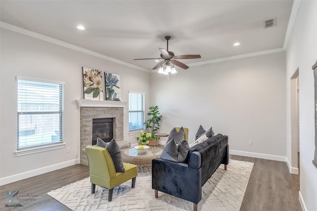 2326 Plymouth Rock Rd, Abilene, TX 79601 - living area featuring healthy amount of natural light, wood finished floors, baseboards, ornamental molding, and recessed lighting