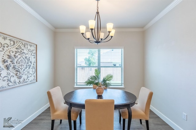 2326 Plymouth Rock Rd, Abilene, TX 79601 - dining space with a chandelier, crown molding, dark wood-style flooring, and baseboards