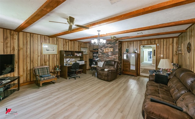 255 Barry Rd, Logansport, LA 71049 - living room with beamed ceiling, wood finished floors, wood walls, a chandelier, and ceiling fan