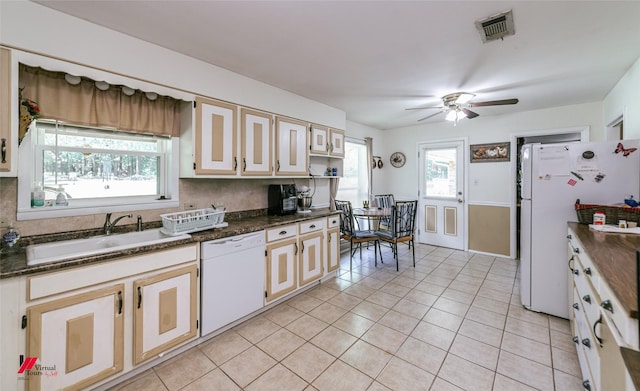 255 Barry Rd, Logansport, LA 71049 - kitchen featuring white appliances, a sink, dark countertops, and ceiling fan