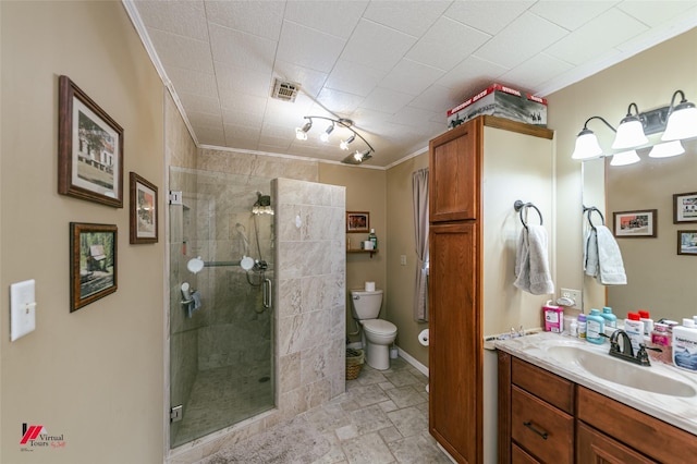 255 Barry Rd, Logansport, LA 71049 - bathroom with crown molding, a stall shower, vanity, toilet, and stone finish flooring