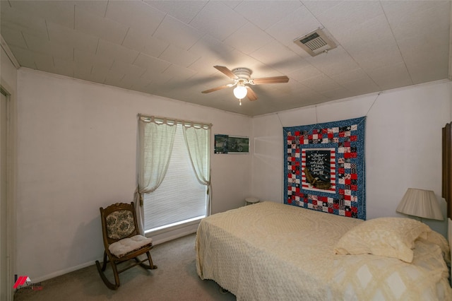 255 Barry Rd, Logansport, LA 71049 - bedroom with carpet flooring, a ceiling fan, and baseboards