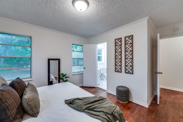 7612 Oxley Dr, Richland Hills, TX 76118 - bedroom with crown molding, wood finished floors, a textured ceiling, multiple windows, and ensuite bath