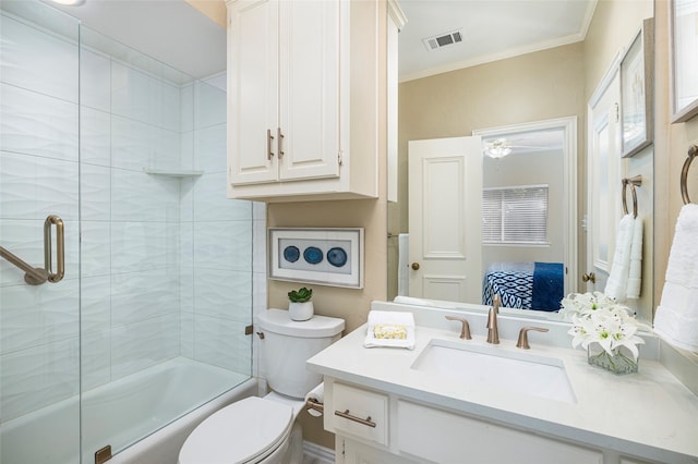 5115 Oak Tree Cir, Dallas, TX 75287 - ensuite bathroom featuring vanity, bath / shower combo with glass door, toilet, and crown molding