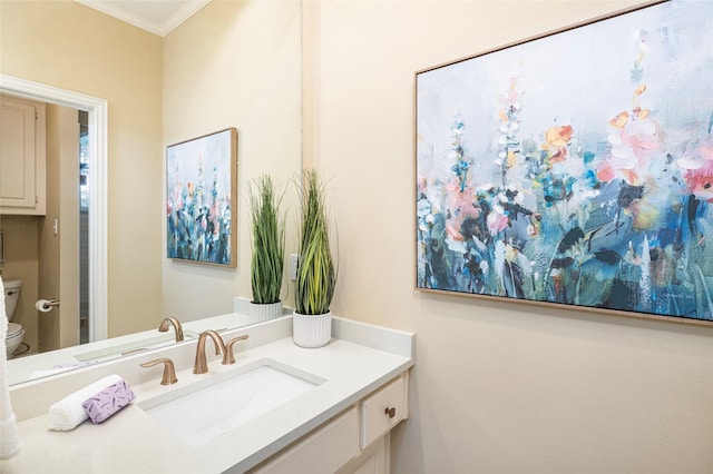5115 Oak Tree Cir, Dallas, TX 75287 - bathroom featuring toilet, vanity, and ornamental molding