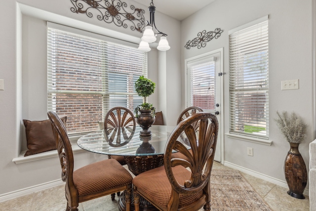 10420 Old Eagle River Ln, Mckinney, TX 75072 - dining space with baseboards and tile patterned flooring