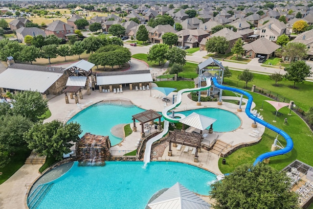 10420 Old Eagle River Ln, Mckinney, TX 75072 - community pool featuring a water slide, a water play area, and a patio area