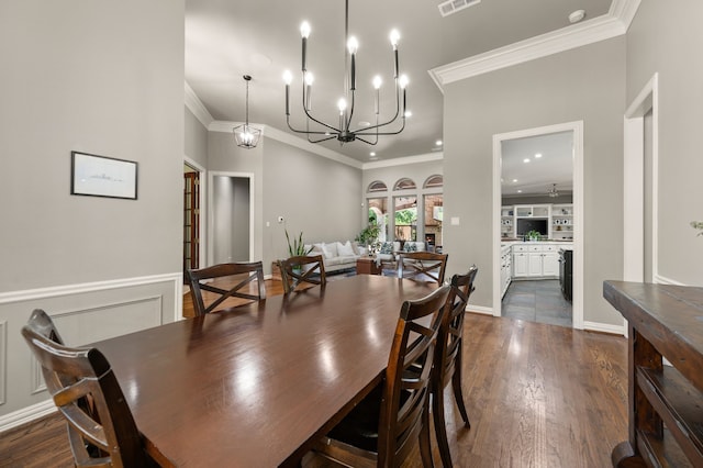 840 Falcon Ln, Coppell, TX 75019 - dining room with crown molding, dark wood finished floors, a chandelier, recessed lighting, and baseboards