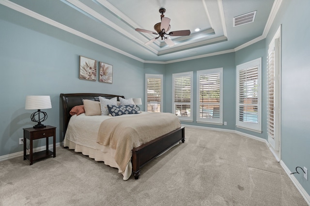 840 Falcon Ln, Coppell, TX 75019 - bedroom featuring a tray ceiling, carpet flooring, crown molding, baseboards, and ceiling fan