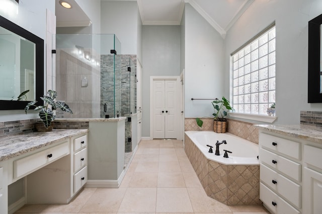 840 Falcon Ln, Coppell, TX 75019 - full bath featuring ornamental molding, vanity, a garden tub, a stall shower, and plenty of natural light