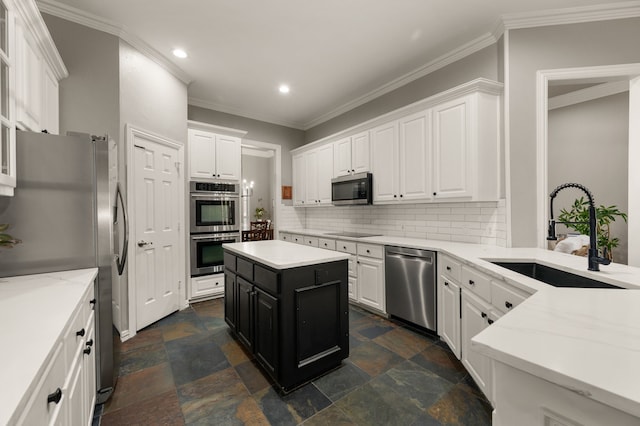 840 Falcon Ln, Coppell, TX 75019 - kitchen with a sink, appliances with stainless steel finishes, recessed lighting, stone tile floors, and white cabinetry