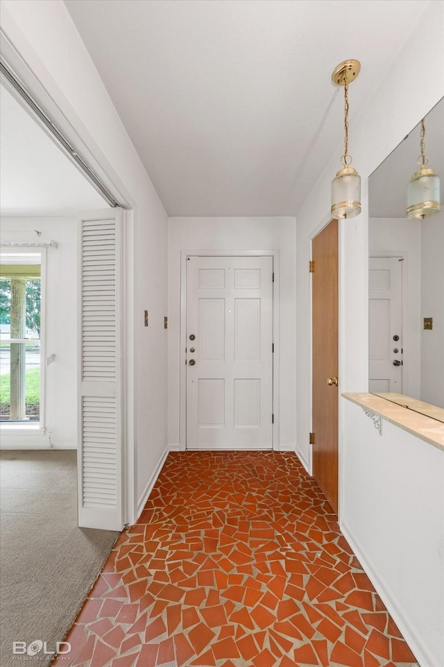 4404 Curtis Loop, Bossier City, LA 71112 - foyer featuring stone floors and baseboards