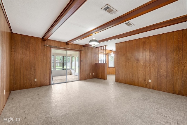 4404 Curtis Loop, Bossier City, LA 71112 - unfurnished room featuring beam ceiling and wood walls