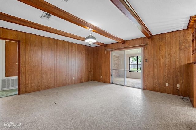 4404 Curtis Loop, Bossier City, LA 71112 - carpeted spare room featuring beam ceiling and wood walls