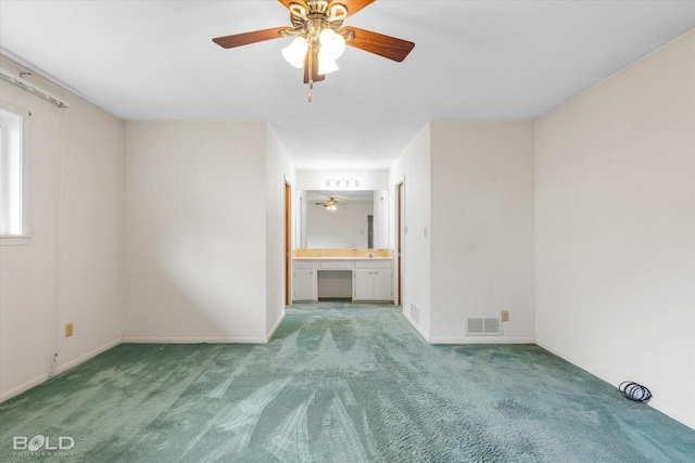 4404 Curtis Loop, Bossier City, LA 71112 - unfurnished bedroom with light colored carpet, baseboards, connected bathroom, and a ceiling fan