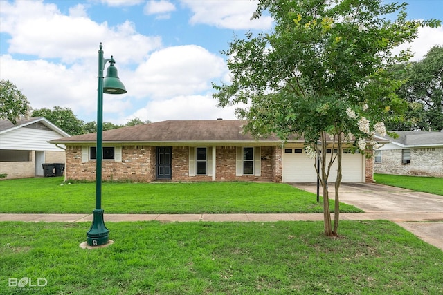 4404 Curtis Loop, Bossier City, LA 71112 - ranch-style home with driveway, a front yard, an attached garage, and brick siding